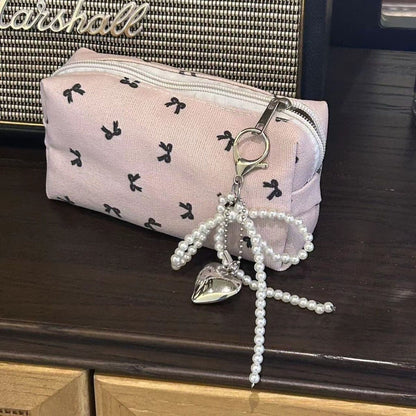 Bow pen bag small student stationery storage bag Girl heart simple large capacity makeup bag